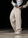 High-Waisted Pleated Trousers